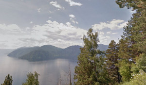 Вид на Телецкое озеро с горы Чичелган.