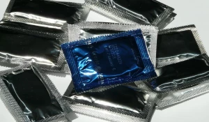 Презервативы.