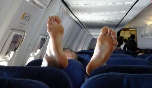 В самолете.