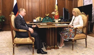 Владимир Путин и Татьяна Голикова.