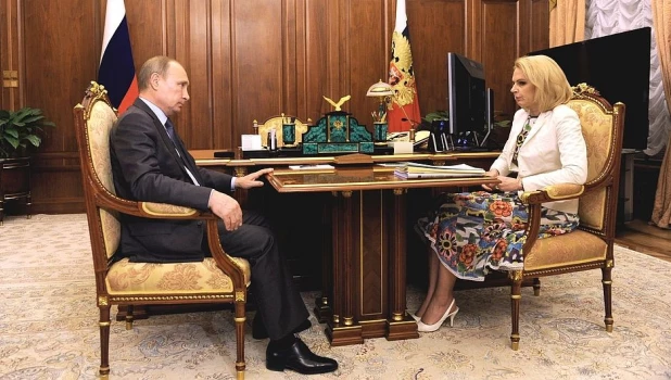 Владимир Путин и Татьяна Голикова.