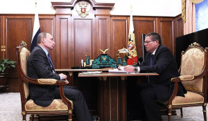 Владимир Путин и Алексей Улюкаев.