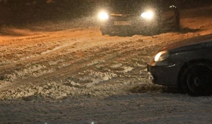 Автомобили  в снегопад.