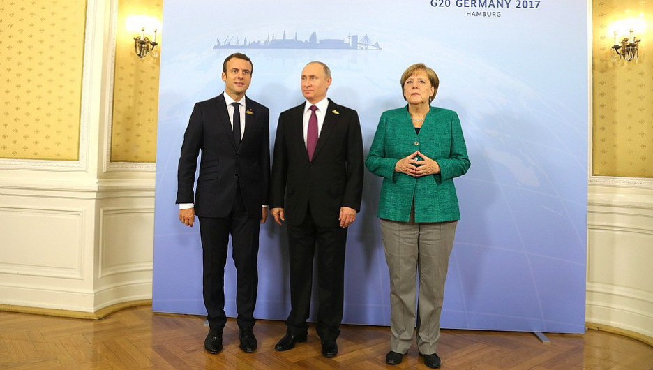 Эммануэль Макрон, Владимир Путин и Ангела Меркель на саммите G20 в Гамбурге.