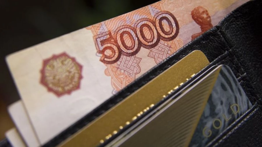 Купюра достоинством пять тысяч рублей. Купюра достоинством пять тысяч рублей.
