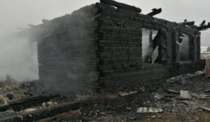 Дом после пожара.