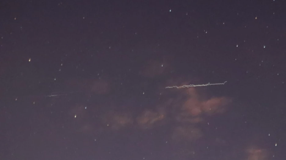 "Поезд" Маска в небе над Омском.