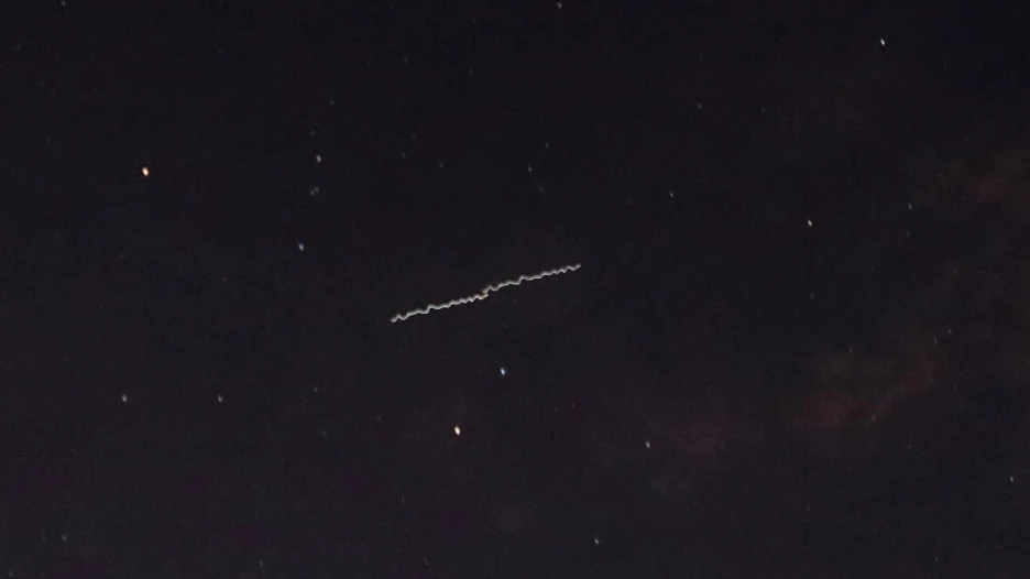 "Поезд" Маска в небе над Омском.