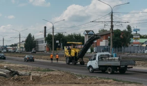 Работы по реконструкции дорожного полотна по ул. Попова.
