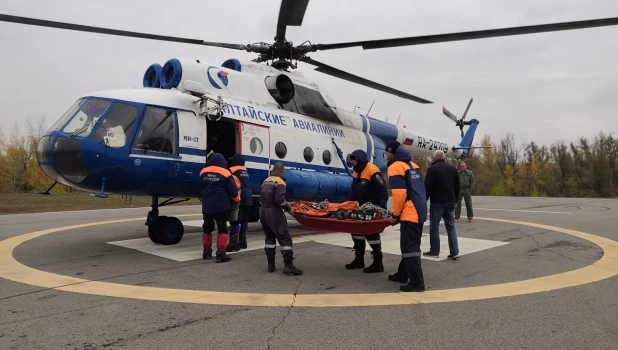 Поиски человека в алтайских горах.