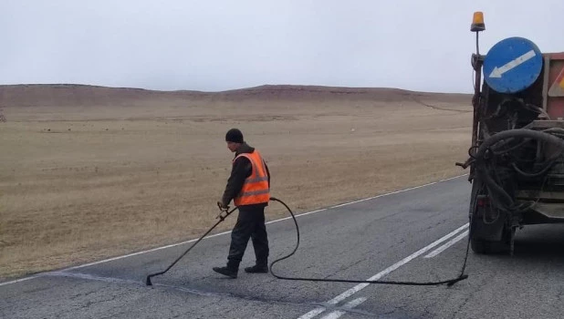 Дорожные работы в Хакасии.