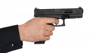 Выстрел из пистолета.