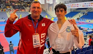 Никита Демин с тренером Дмитрием Савельевым 