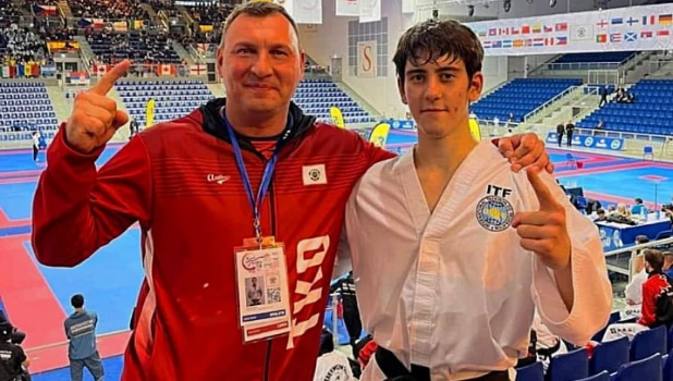 Никита Демин с тренером Дмитрием Савельевым 