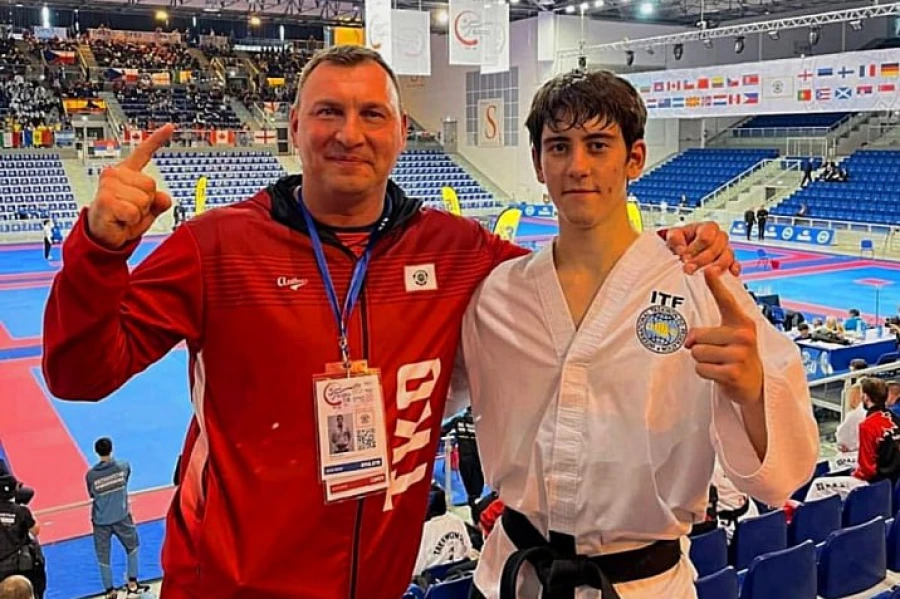 Никита Демин с тренером Дмитрием Савельевым 