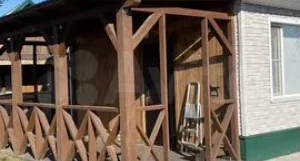 Дача с лужайкой для отдыха и огородом.