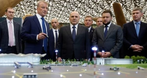 Перед началом совещания по развитию туризма.