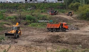 Тяжелая техника в овраге